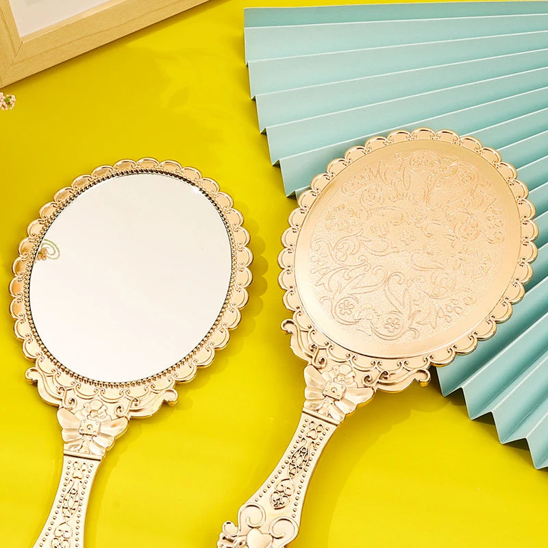 Rose Gold Portable Vintage Makeup Mirror Hand Hold Oval Round Mirror Noble Restore Ancient Ways Court Mirror Beauty Tool Vue
