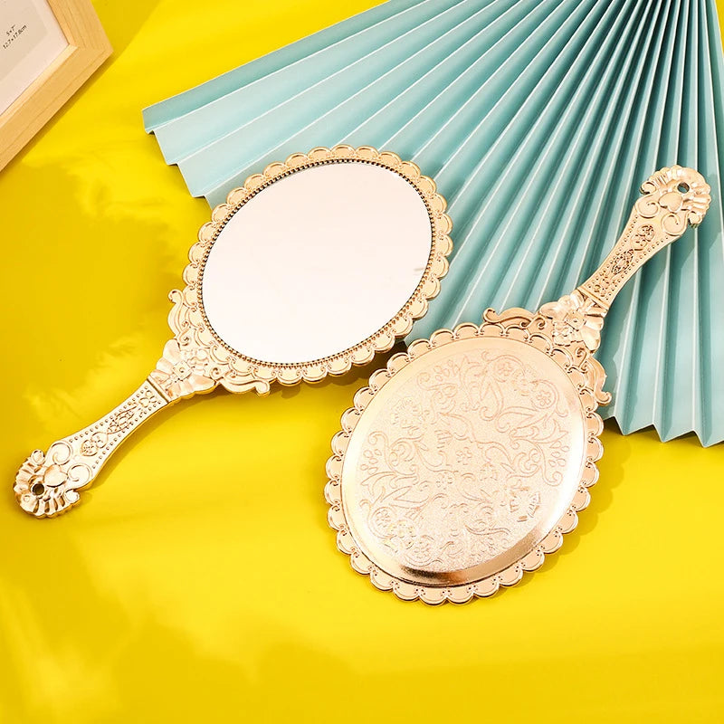 Rose Gold Portable Vintage Makeup Mirror Hand Hold Oval Round Mirror Noble Restore Ancient Ways Court Mirror Beauty Tool Vue