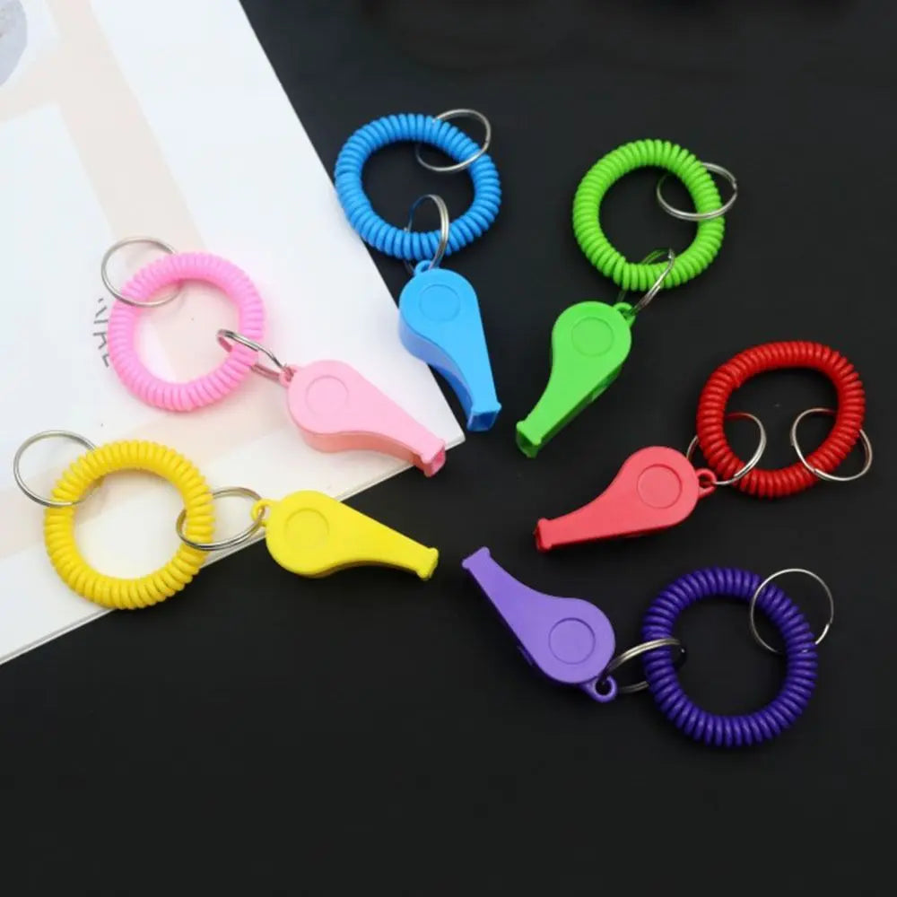 10Pcs Loud Crisp Sound Spring Wristband Whistle Colorful Plastic Sport Whistle Durable Emergency Referee Whistle Sports Training Vue