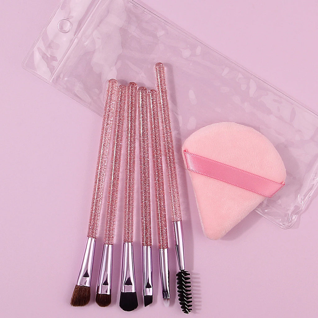 6pcs soft bristle multi-functional eye brush with glitter handle +1pcs triangular powder puff +1pcs portable pvx storage bag Vue