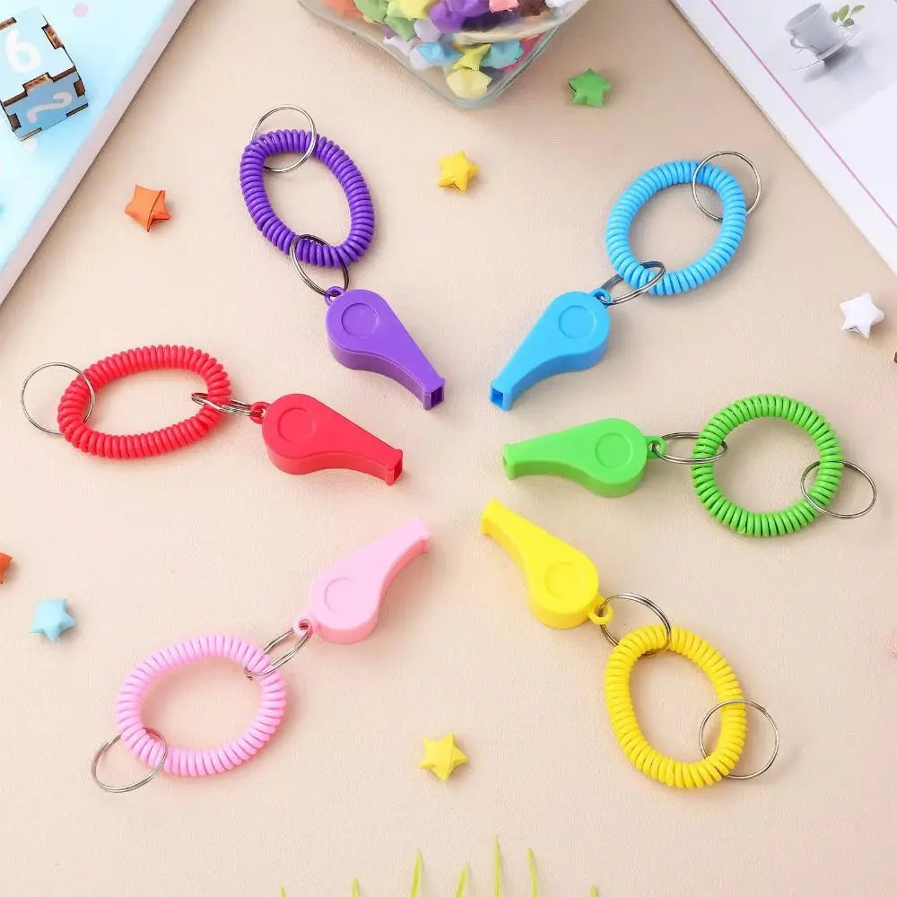10Pcs Loud Crisp Sound Spring Wristband Whistle Colorful Plastic Sport Whistle Durable Emergency Referee Whistle Sports Training Vue