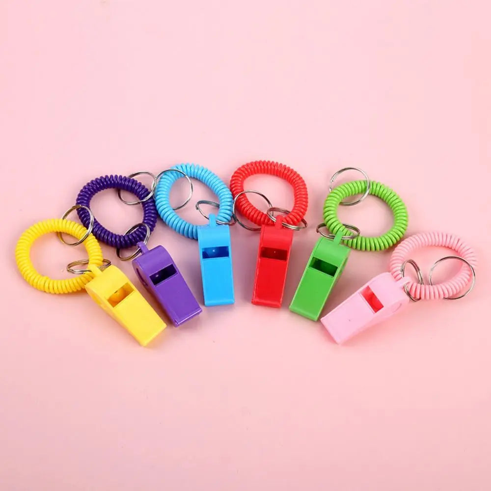 10Pcs Loud Crisp Sound Spring Wristband Whistle Colorful Plastic Sport Whistle Durable Emergency Referee Whistle Sports Training Vue