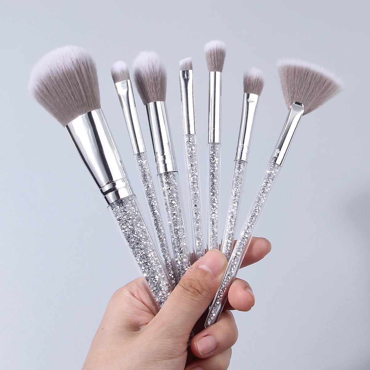 7-pc silver diamond makeup brush set - large powder brush, fan-shaped blush brush, brush for eye smudging, and highlighter brush Vue